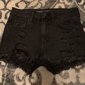 Black distressed shorts